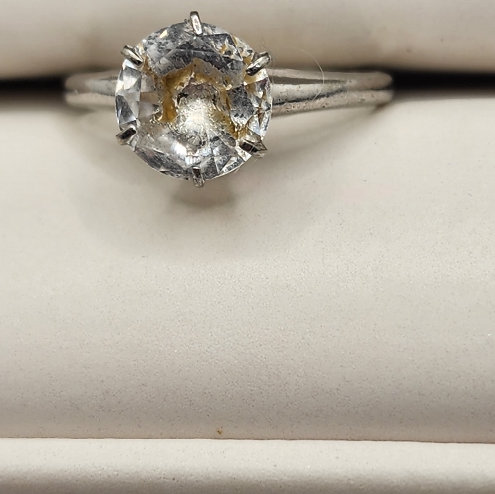 3 carat round brilliant diamond set in sterling silver.